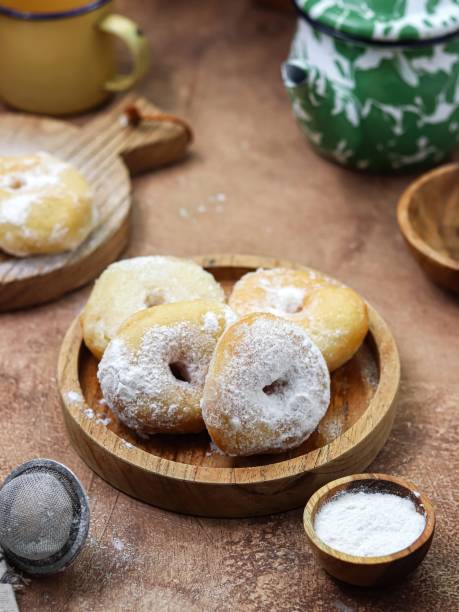 istock Donat Kampung, Donuts or doughnuts sprinkled with powdered sugar 1721181781