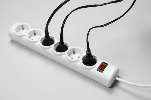 istock Power strip with electrical plugs on white background 1721188834