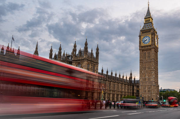 istock Big Ben in London, England with a red trolly. 1721209042