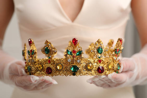 istock Bride holding luxurious crown on grey background, closeup view 1721211646