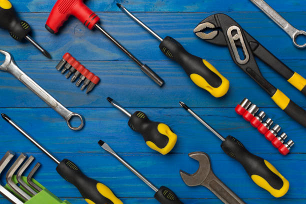 istock Set of tools on wooden background, top view 1721222600