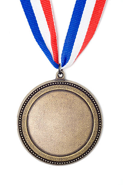 A gold medal on a multi-colored ribbon.