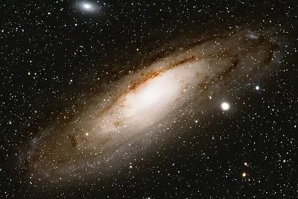 This is an high resolution picture of our neighbour galaxy, in the constellation Andromeda(also designated M31) .The galaxy at a distance of 2.25 million light-years consists of 200 billion stars.The image is taken with a Canon EOS 300 (modify for Astro images) in the in prime focus of professional refractor-telescope 600mm f/7.5 Exposure time is 80 minutes.