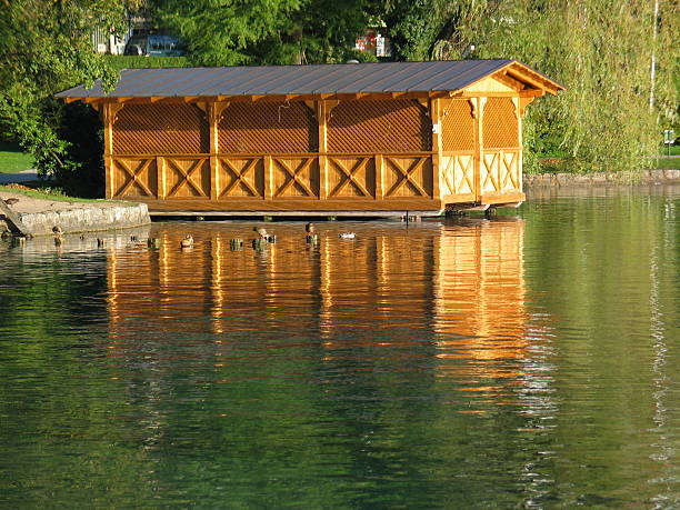 istock Lake cottage in sunset colours 172123680