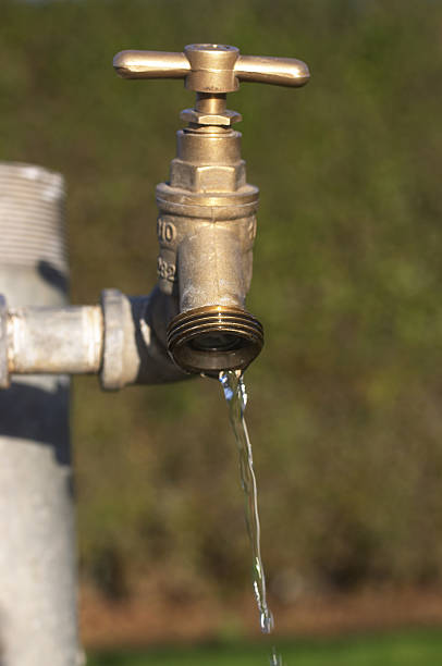 istock Brass tap leaking water wasteage 172123972