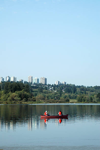 Canoe on a lake stock photo