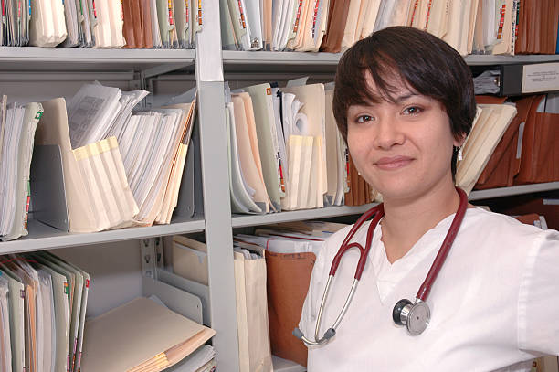 istock Medical Gal at the File Stacks 172124213