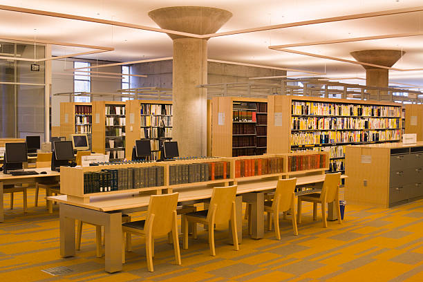 istock Library Interior Featuring Computers, Tables, Books, Shelves,  Chairs, Reading Areas 172124540