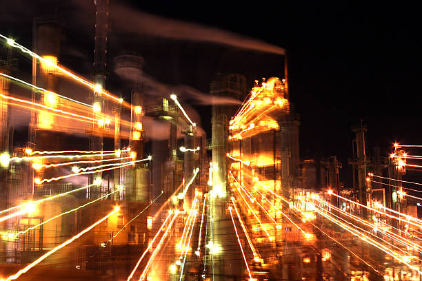 Timed exposure of a refinery with a zoom at the end of the exposure time.  Creates an interesting light pattern for background use. 