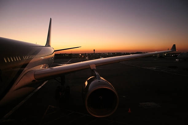 Sun rising as the first flight gets ready to go. 
