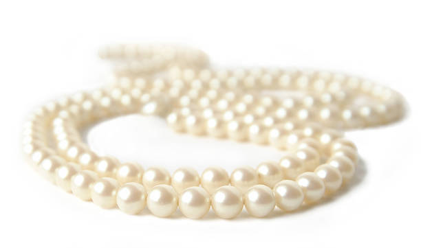 istock Pearl Necklace Lying on a White Background 172124991