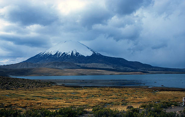 istock Parinacota volcano, clouded sky 172125467