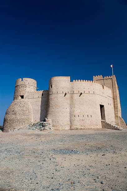 Fujairah Fort United Arab Emirates Fujairah Fort against deep blue sky, built in 1670, considered the oldest fort in the UAE , City of Fujairah, Fujairah Emirate, United Arab Emirates fujairah stock pictures, royalty-free photos & images