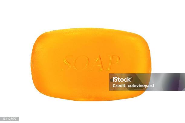 A Single Bar Of Orange Soap On A White Background Stock Photo - Download Image Now - Bar Of Soap, Soap Sud, Cut Out