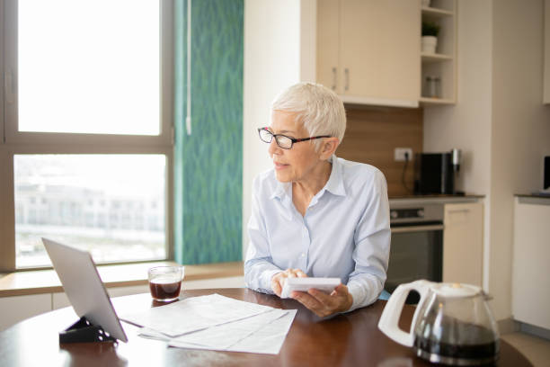 istock Woman is going through household finances 1721268862
