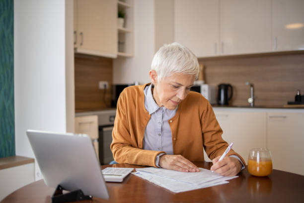 istock Woman is going through household finances 1721268876
