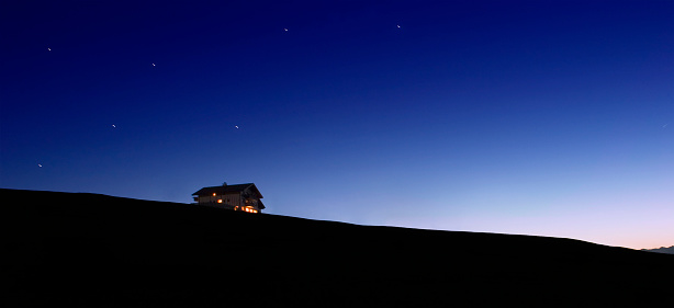 a lonely mountain hut in the austrian alps