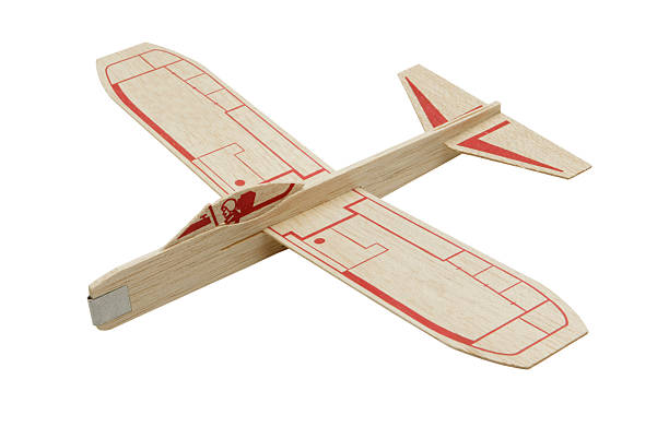 Toy Airplane A child's toy balsa wood airplane toy airplane stock pictures, royalty-free photos & images