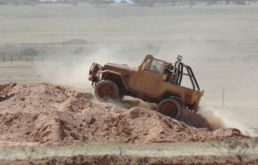 2 door 4wd vehicle competes in a 4x4 competition event 