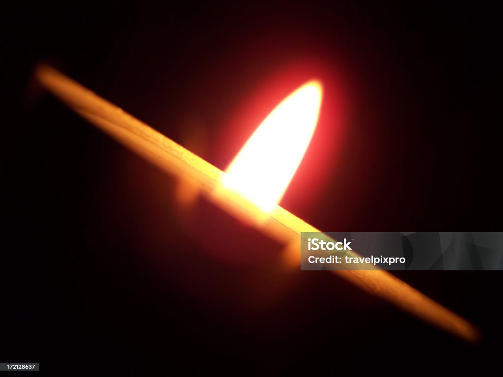 Angled Flame with Red Aura Candle flame macro producing a red aura. Aura Stock Photo