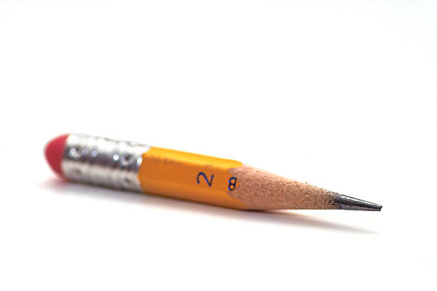 Number 2 Pencil Stub Narrow depth of field macro photo of number 2 pencil stub, primary focus on graphite tip. nub stock pictures, royalty-free photos & images