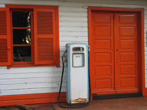 Antique gas pump at old filling station on an estancia in Argentina near Igauzu falls.