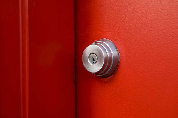 istock Locked Red Door and Doorframe Close Up 172128984