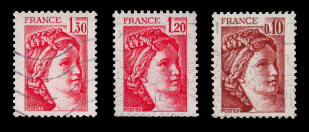 3 vintage stamps, cancellation marks visible