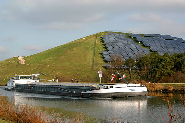 barge and solar power station solar panels on a hill in Fuerth, Franconia, Germany and canal boat fuerth stock pictures, royalty-free photos & images