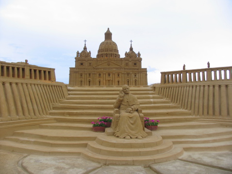 A Sandcastle depicting the pope in front of St Peter's basilica. in Knocke, Belgium
