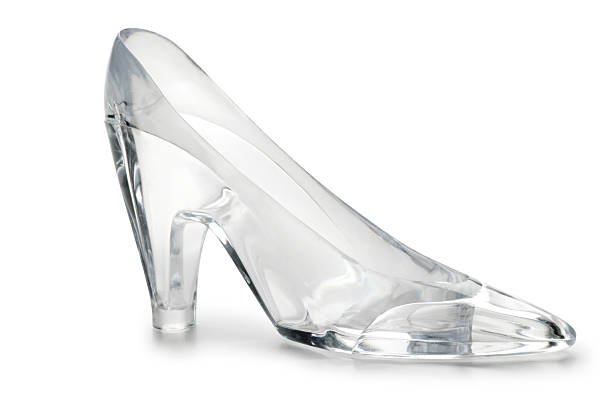 Glass Slipper A glass slipper on white with soft shadow crystal glassware stock pictures, royalty-free photos & images