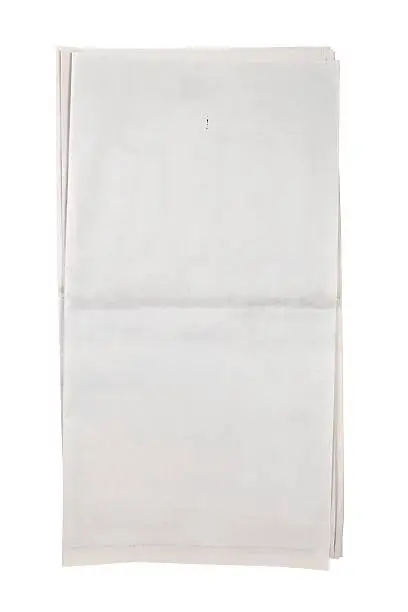Open sheets of blank newspaper folder in the middle.