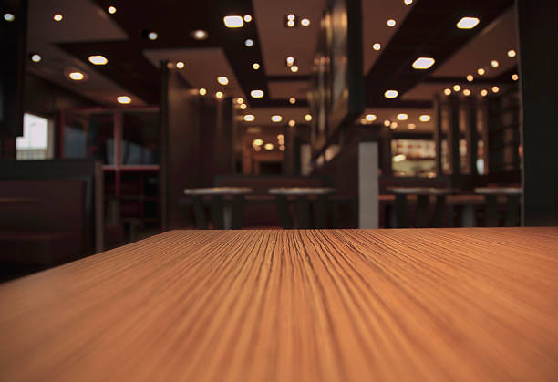 レストランのテーブル - brown table inside ストックフォトと画像