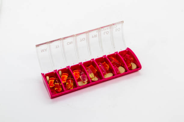 istock Dosette with medicine isolated on white 1721302375