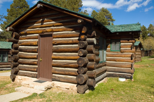 Rustic log cabins in a national park.