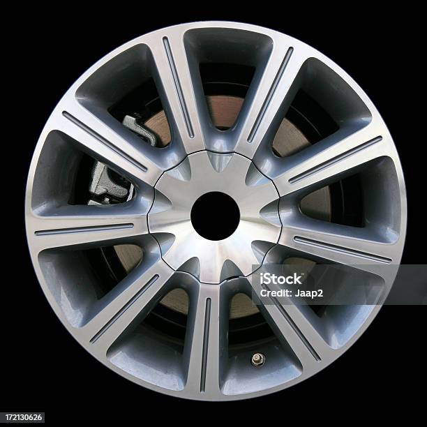 Side View Of An Alloy Car Wheel Isolated On Black Stock Photo - Download Image Now - Wheel Rim, Air Valve, Alloy