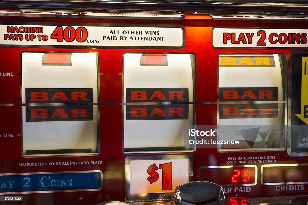 Casino Slot Machine Jackpot Close-up of a dollar slot machine at a casino. Slot Machine Stock Photo