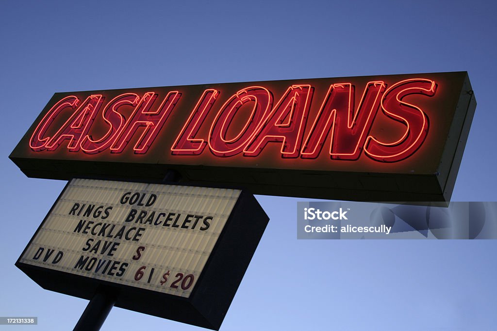 Angle Cash Loans Sign Cash Loans sign shot at an angle. Billboard Stock Photo