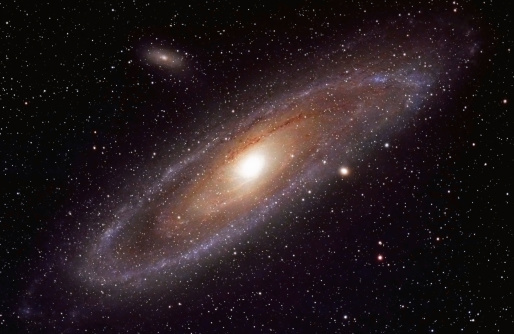 Telescope image of the Andromeda Galaxy (M31) taken from my backyard observatory. 12 hours total exposure time.