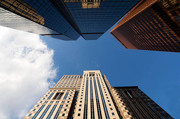 istock Looking Up through skyscrapers to the sky 172132641