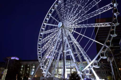 City centre ferris wheel against a night sky