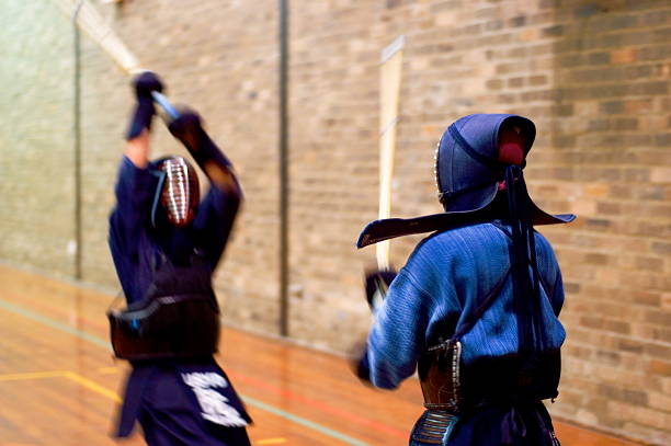 Two students Kendo training at University level stock photo