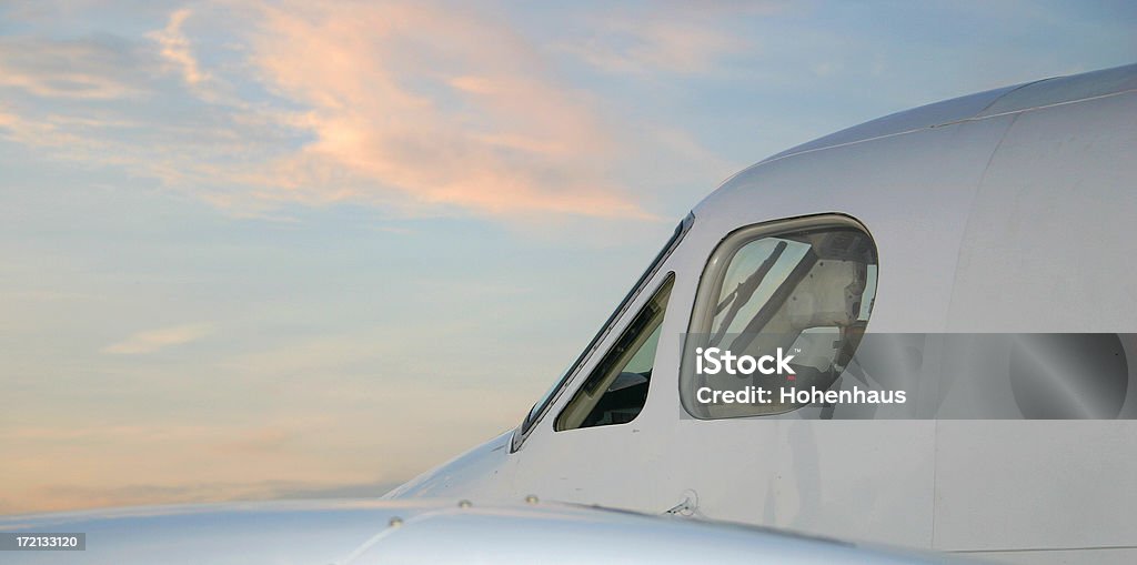 Atardecer de vuelo - Foto de stock de Ala de avión libre de derechos