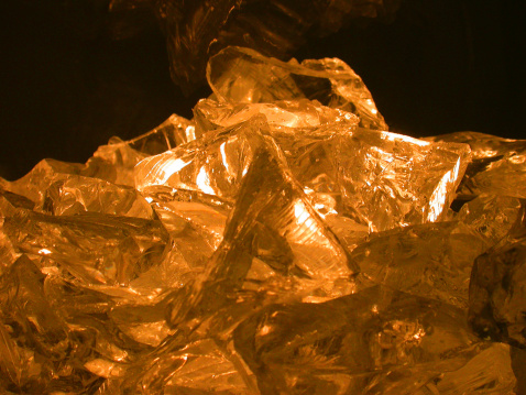 Rock crystals glowing in the amber dark.