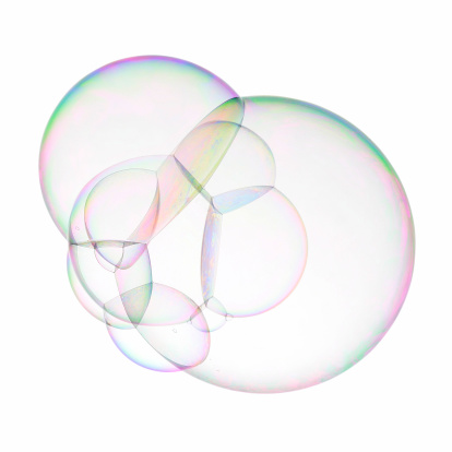 Huge multiple soap bubble isolated on white.