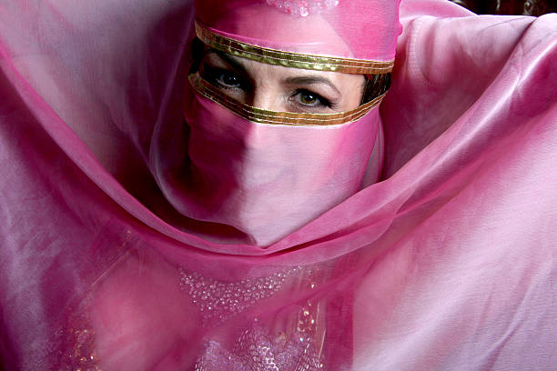 belly dancer wih veil belly dancer with veil moroccan girl stock pictures, royalty-free photos & images