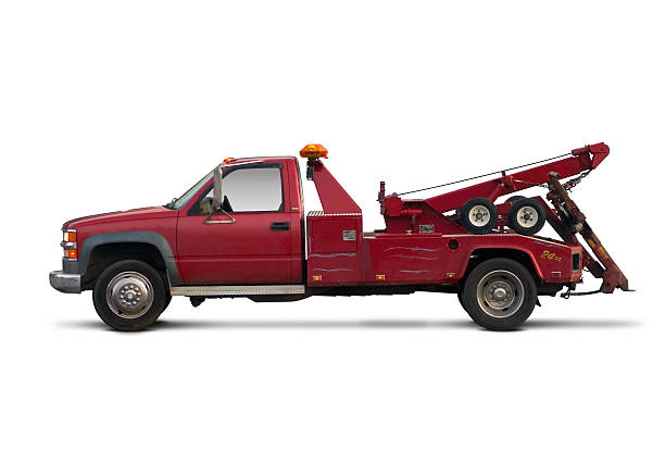 Red tow truck Red tow truck with complete work path. tow truck stock pictures, royalty-free photos & images
