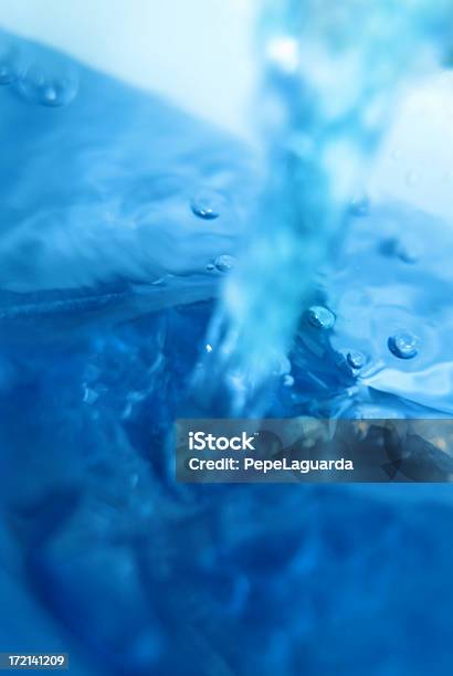 Abstract Pouring Water Stock Photo - Download Image Now - Abstract, Backgrounds, Blue