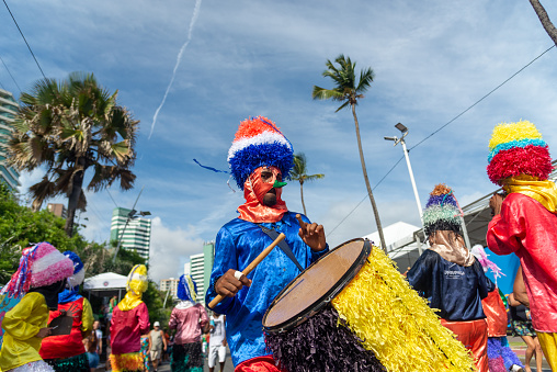Salvador, Bahia, Brazil - February 11, 2023: Cultural group Zambiapunga parades during Fuzue, pre-carnival in the city of Salvador, Bahia.