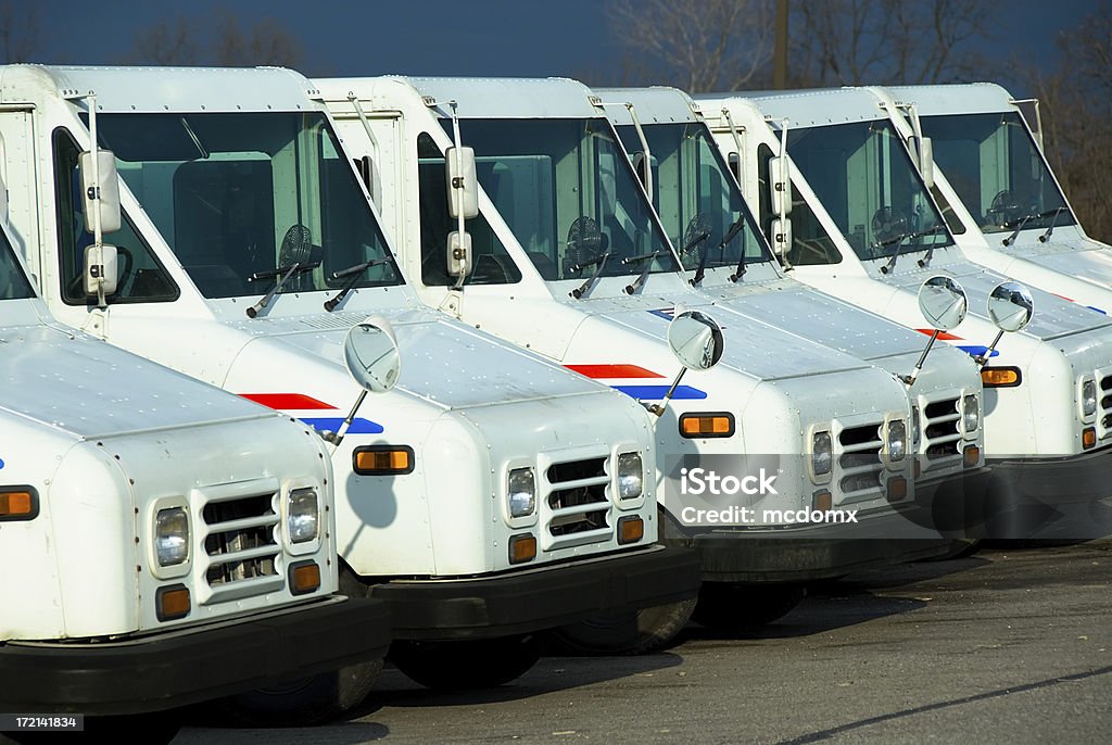 Here Comes the Mailman! Line of postal delivery trucks ready to go.Another similar image... United States Postal Service Stock Photo